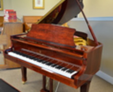 Story and Clark player baby grand